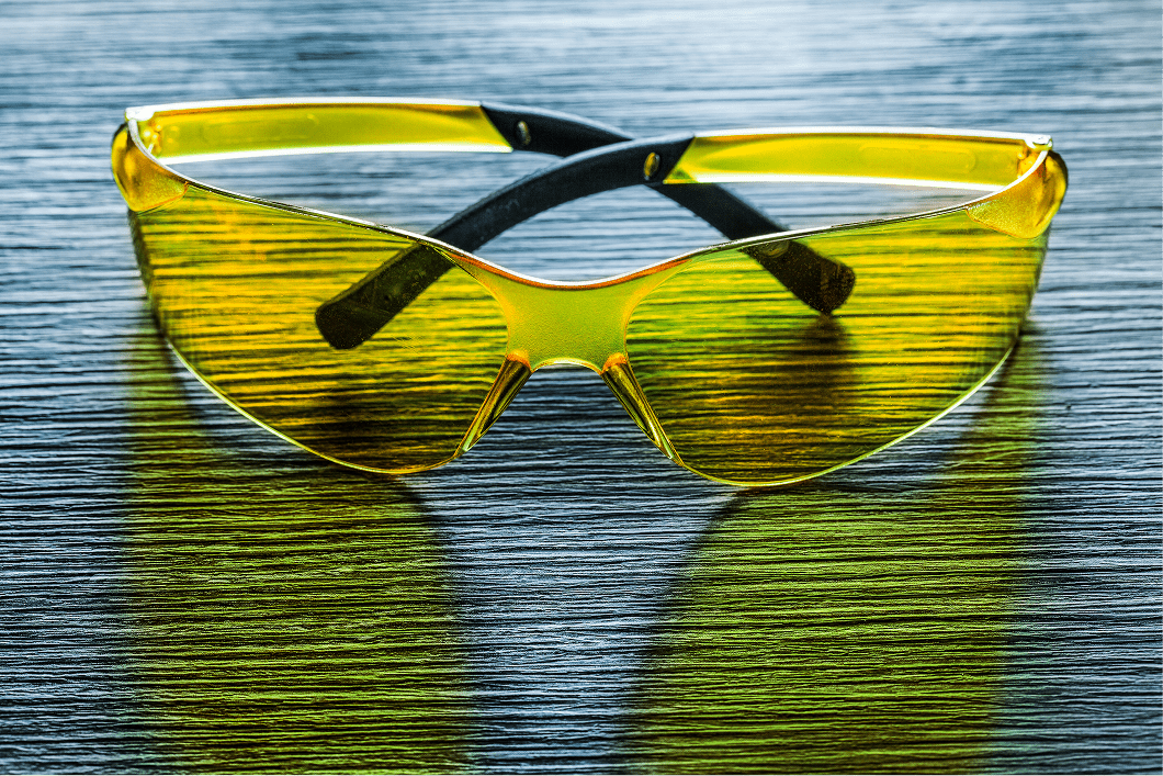 safety-goggles-on-wooden-board-top-view-2026-01-11-09-45-24-utc 1